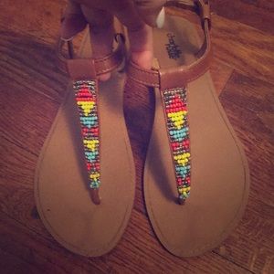 Tribal buckle sandals